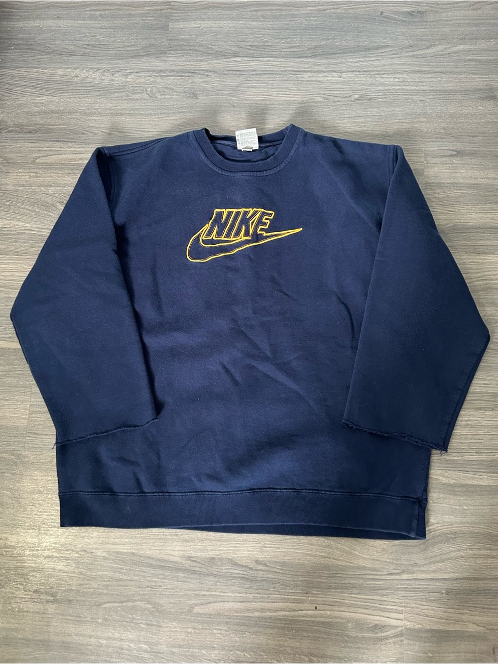 Nike Men’s Navy Crewneck Sweatshirt with Embroidered Yellow Swoosh Spellout